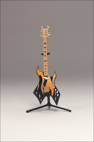 Illustration for article titled McFarlane's Tiny, Plastic Guitar Hero Guitars